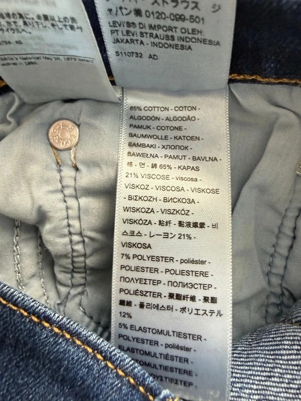 Levi's mid blue straight jeans with classic five-pocket styling and comfortable stretch fit.