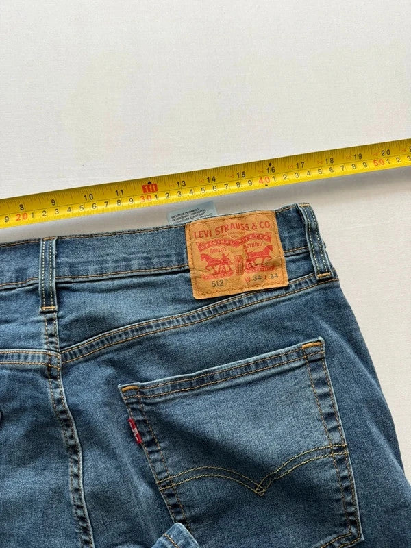 Levi's blue straight jeans with slim tapered fit and zip fly closure.