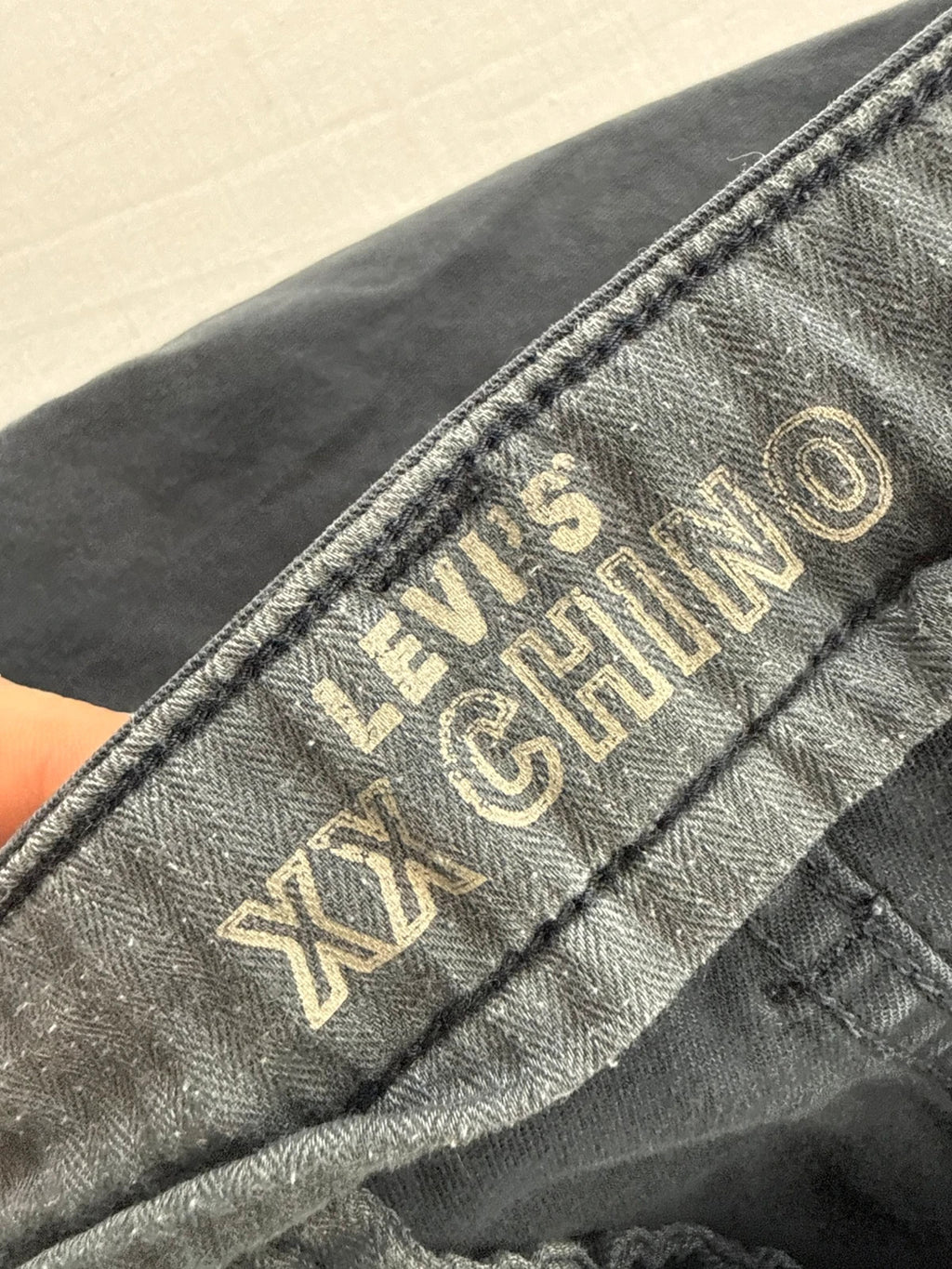 Levi's grey chino trousers slim tapered fit with red tab and slanted pockets.