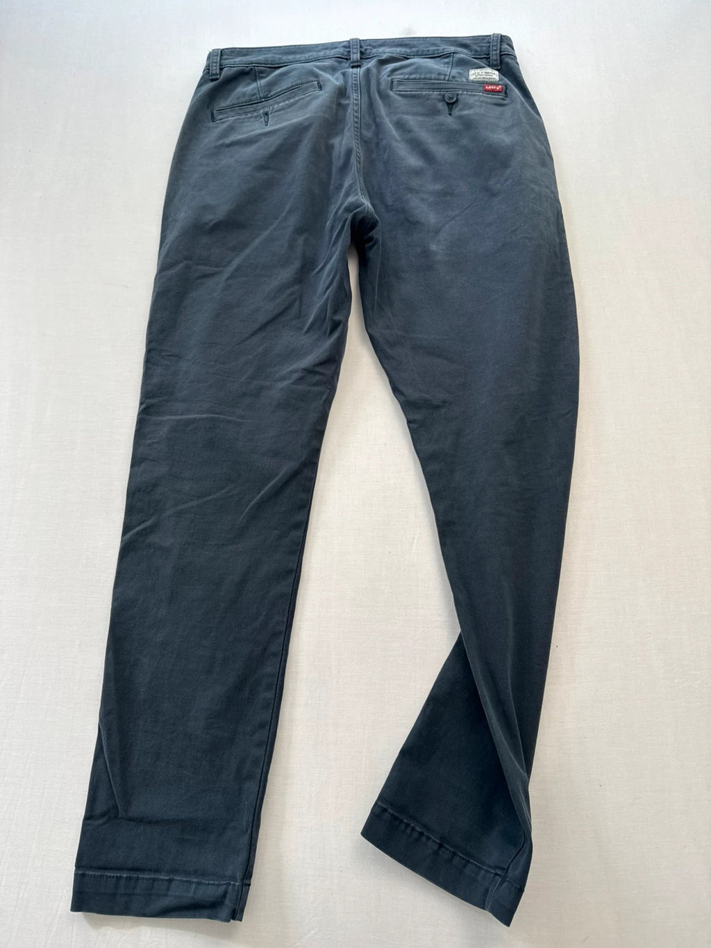 Levi's grey chino trousers slim tapered fit with red tab and slanted pockets.