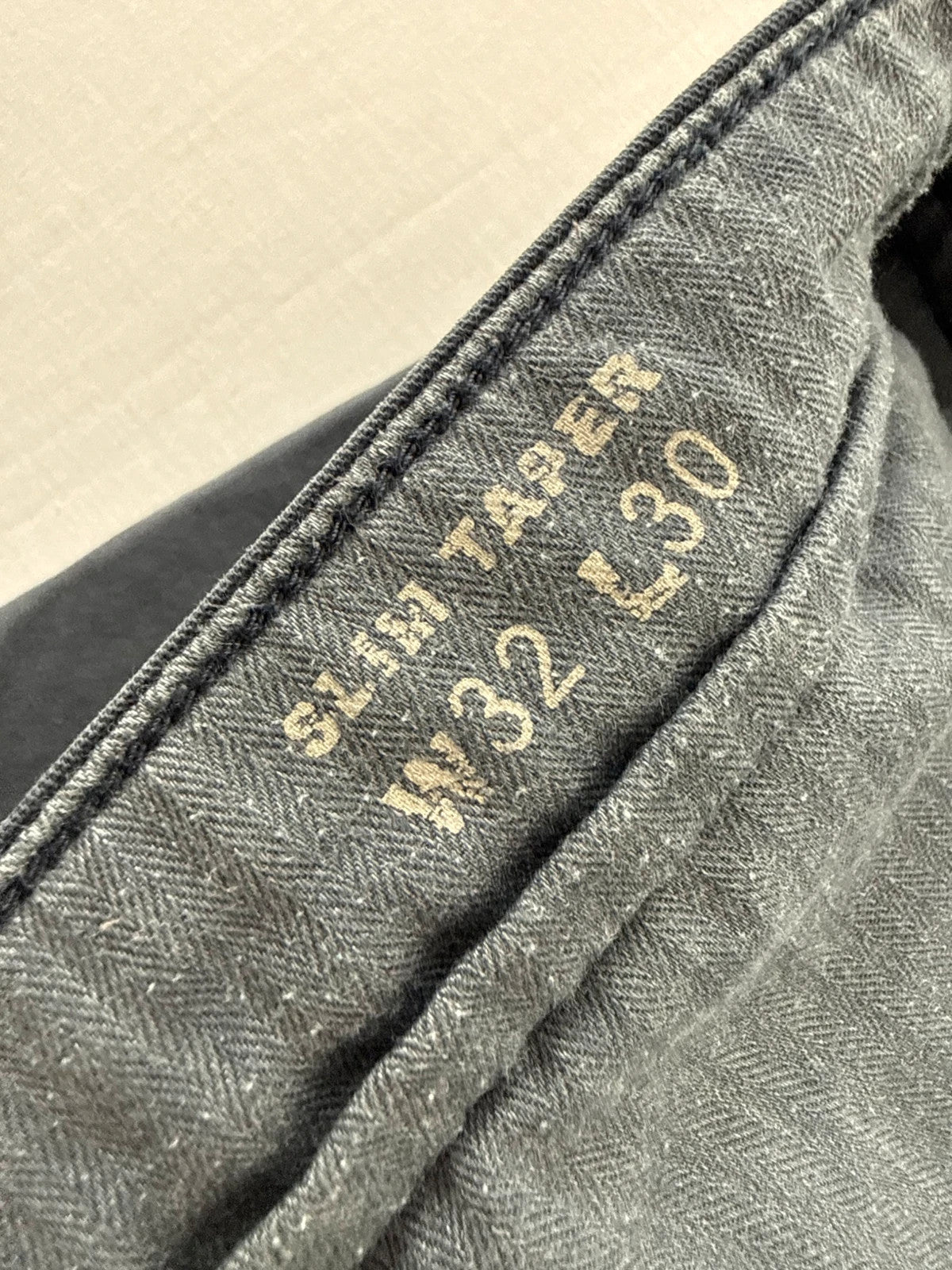 Levi's grey chino trousers slim tapered fit with red tab and slanted pockets.