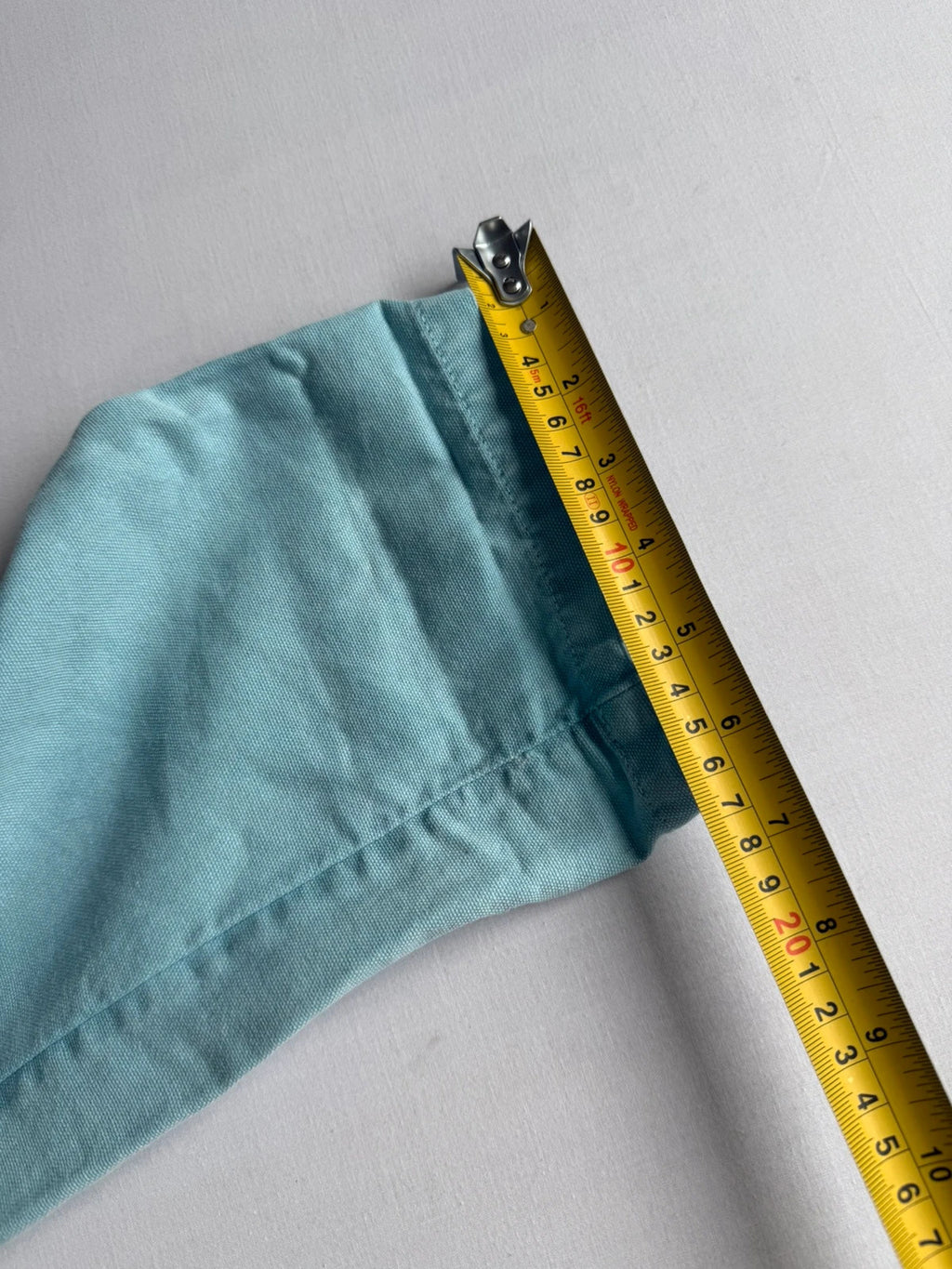Lucy & Yak light blue dungarees with tie-up straps and large bib pocket, organic cotton.